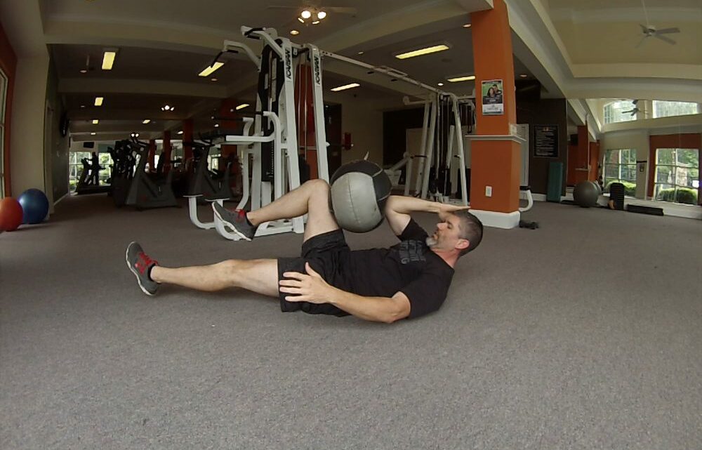 Lying Single Leg Bicycle Kick (With Medicine Ball)